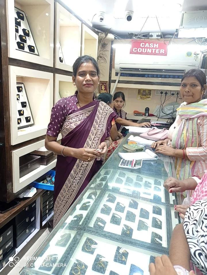 Staff assisting a customer at the Kangan Jewellers counter